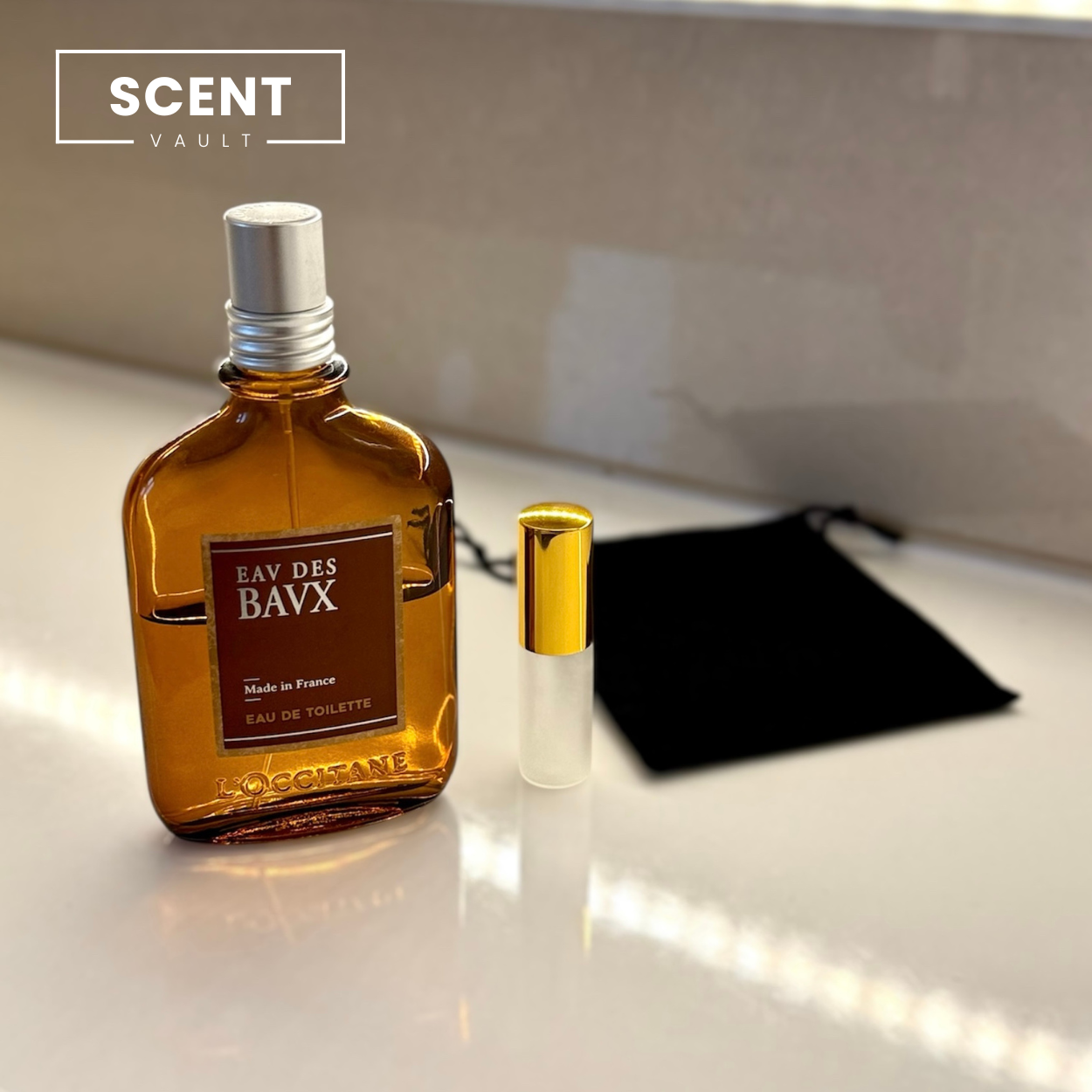 Brown perfume bottle with silver cap and gold spray nozzle on a reflective surface, with 'SCENT VAULT' branding.