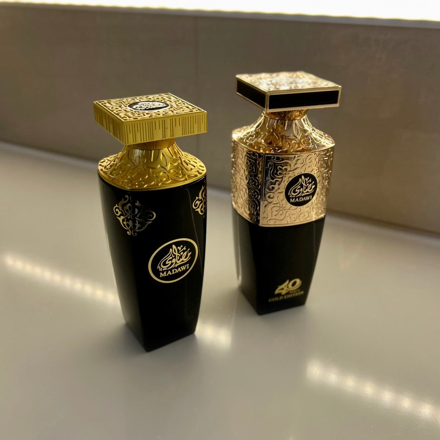 Arabian Oud Madawi & Madawi Gold Edition bottles side by side, showcasing luxurious Arabian fragrances. Available in decants for affordable, travel-friendly luxury.