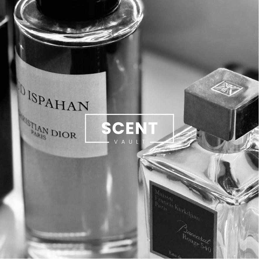 Two perfume bottles, one by Christian Dior and the other by Baccarat Rouge 540' Scent Vault' branding.