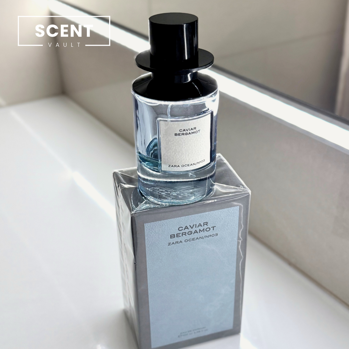 Zara x Jo Malone Caviar Bergamot bottle standing on top of its grey-blue box - Scent Vault